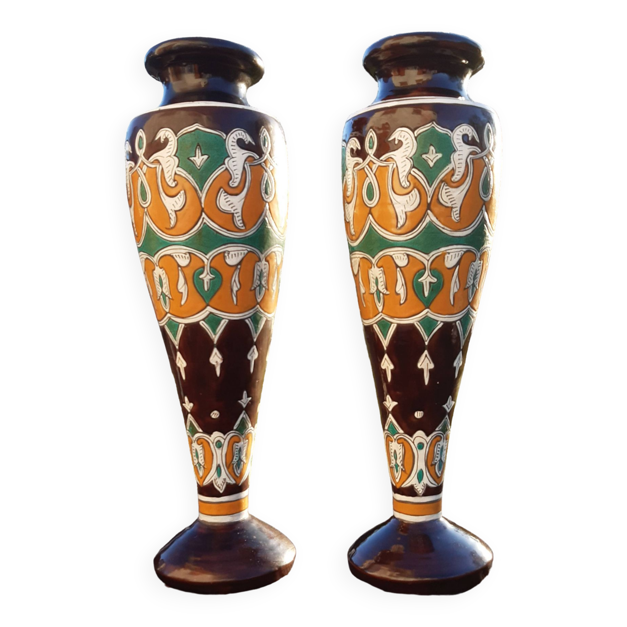 pair of old vases with art deco motifs