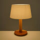 Lampe de table en bois à fut trilobé circa 1970