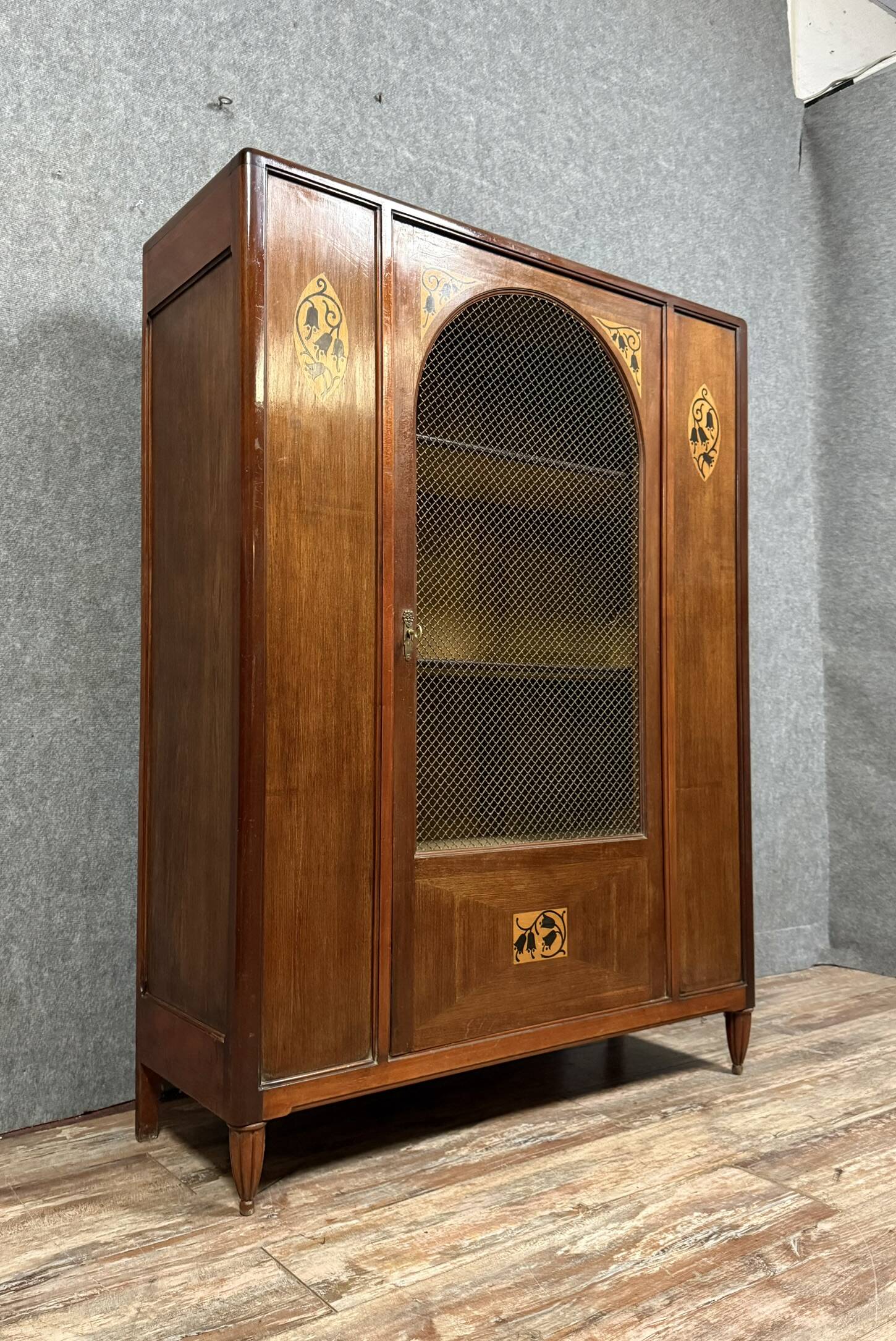 According to Maurice Dufrene: Art Nouveau period marquetry library around 1900