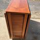 Brown walnut drop-leaf dining table with 2 matching chairs, 1960s (set of 3)