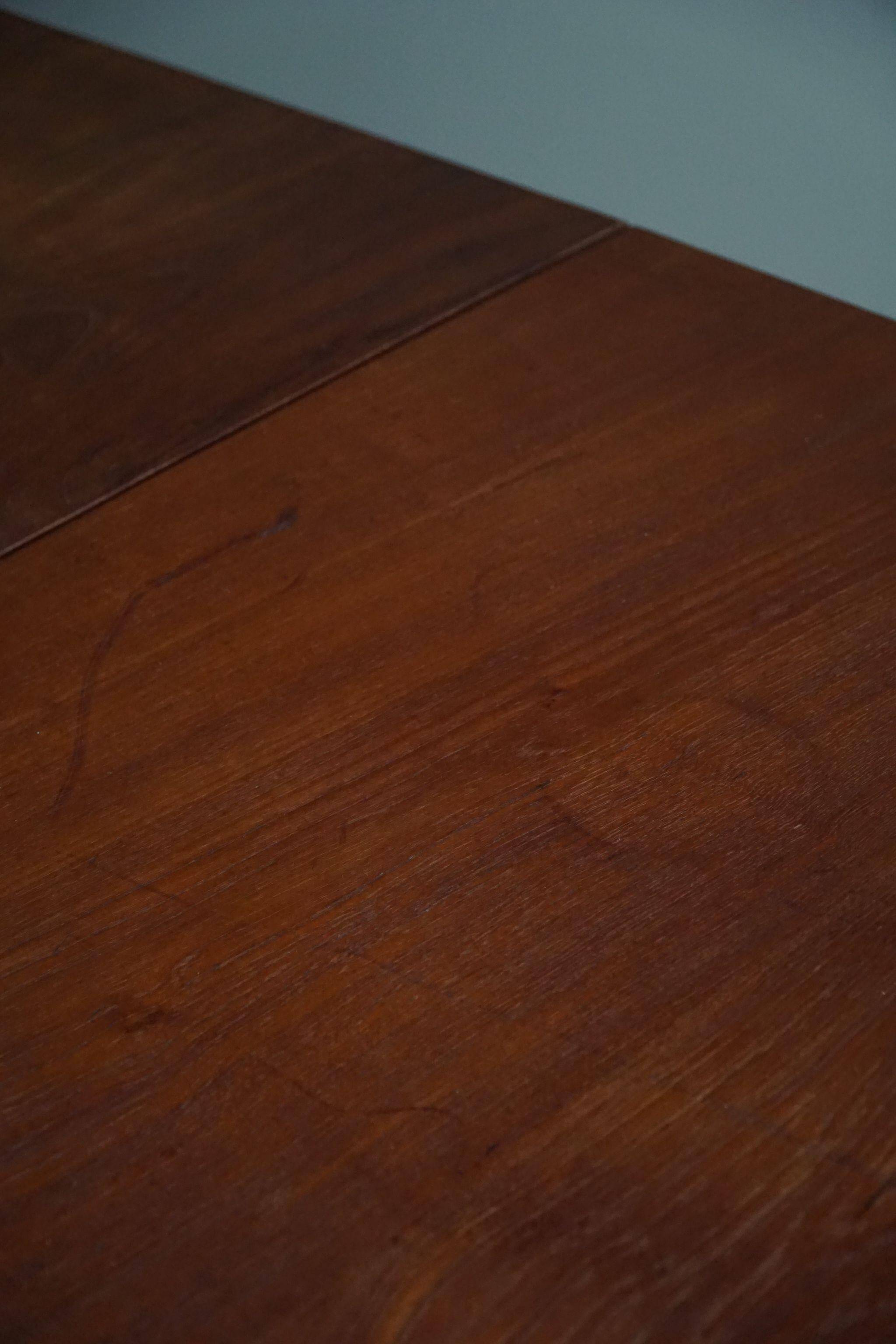 Art Deco dining table in teak, with butterfly extension, Danish cabinetmaker, 1940s.