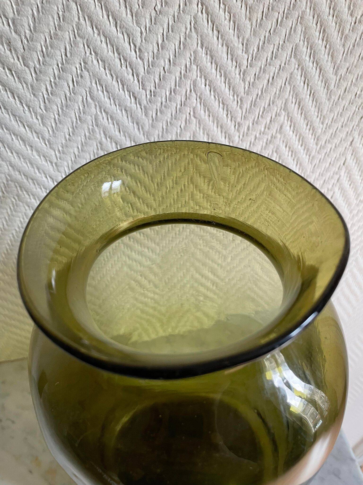 Large green blown glass vase
