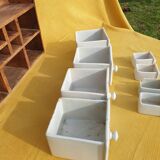 Vintage wooden spice rack with ceramic drawers