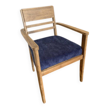 Art Deco armchair in solid wood and blue corduroy fabric.