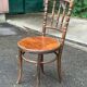 Vintage 19th-century bistro chair in curved solid wood, Thonet style.