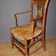 Pair of straw armchairs in cherry wood Directoire early XIX