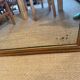 Grand miroir ancien en bois patiné doré