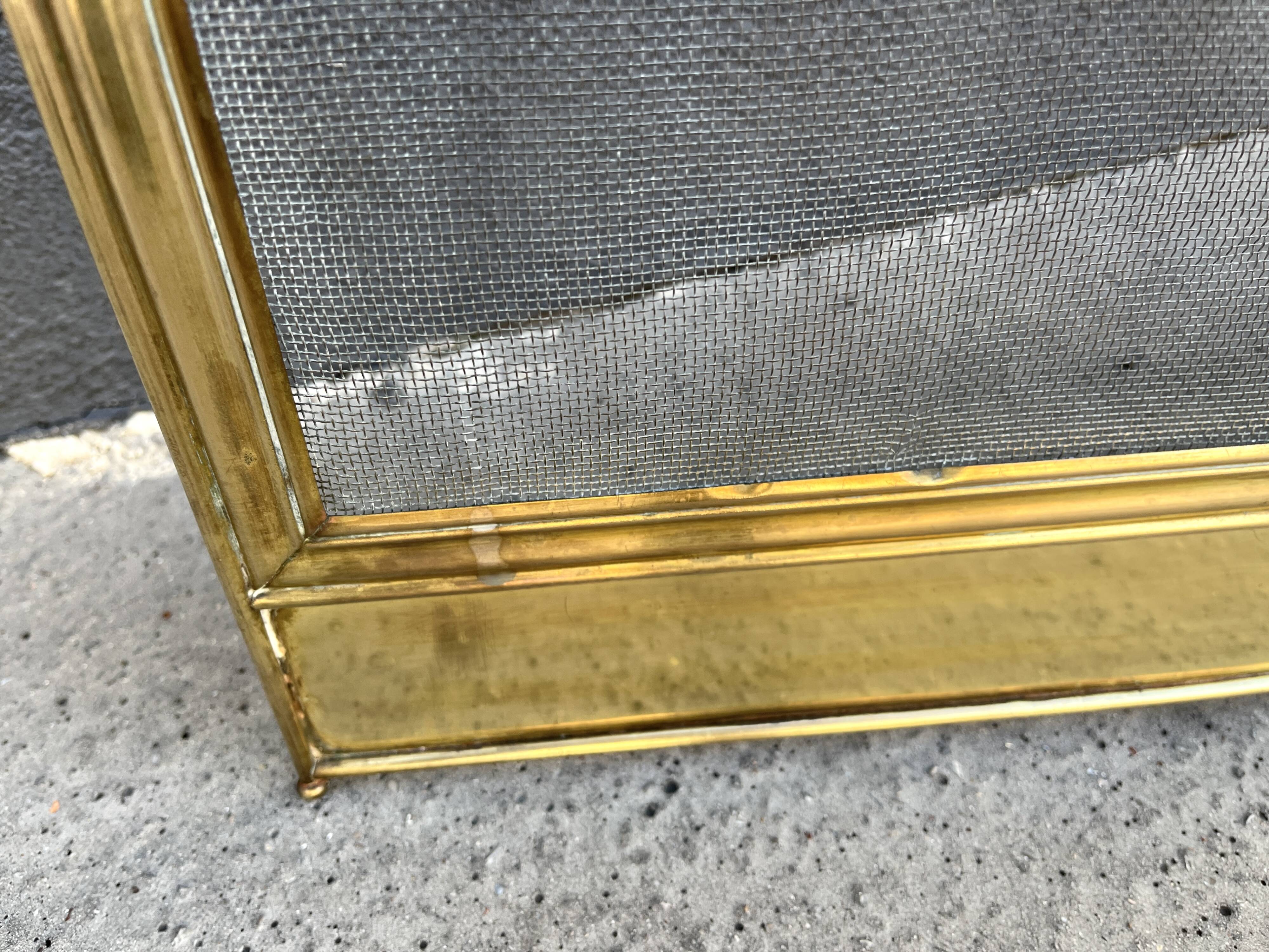 19th-century fireplace screen by Bouhon Frères in brass