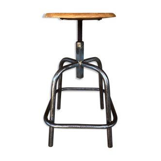 Industrial tabouret has vintage wood and metal screws 70s