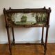 Old planter with painted earthenware