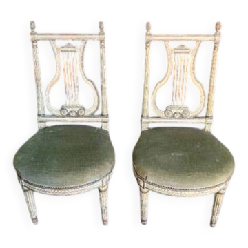 Pair of Louis XVI style chairs from the 18th century with lyre back.
