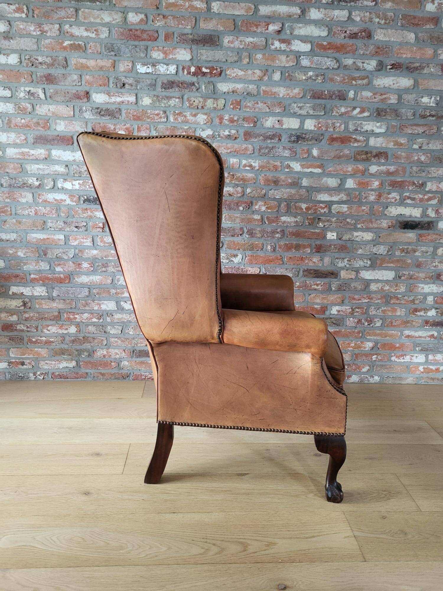 Antieke cuir Chesterfield wingback ourfauteuil Chippendale style cognac