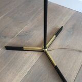 Designer floor lamp in black lacquered metal and brass