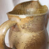 Pitcher in sandstone