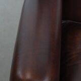 Very beautiful wing chair made of cowhide leather in English style