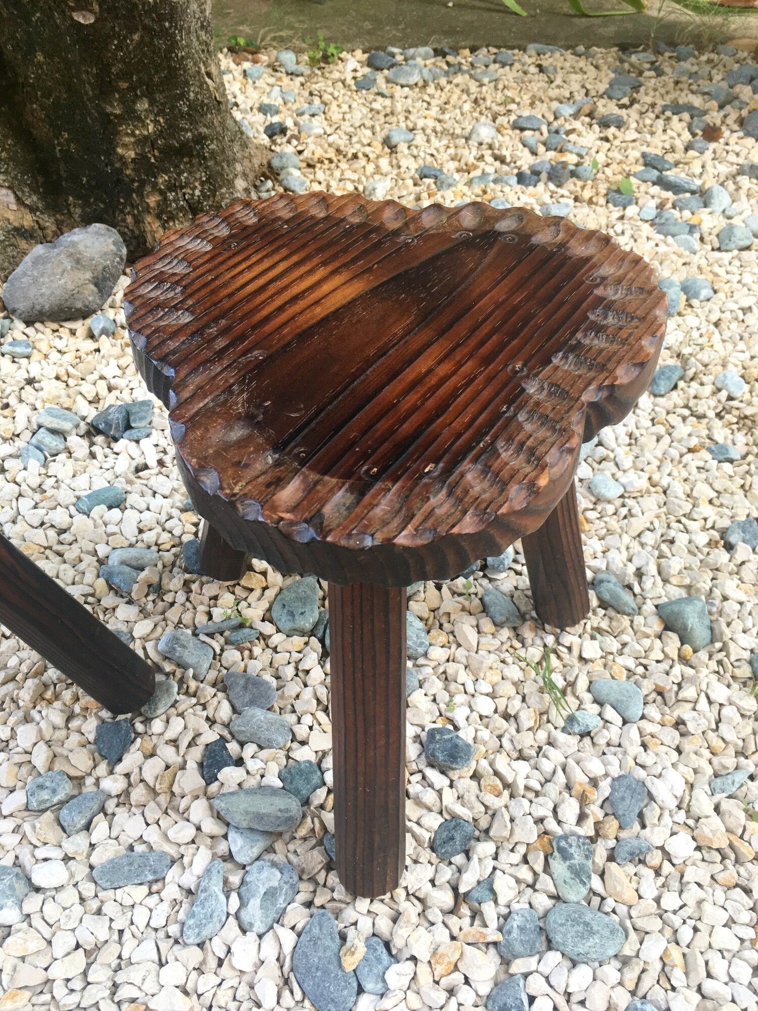 2 vintage tripod stools in solid wood