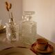 Carved glass decanter registered model made in France""