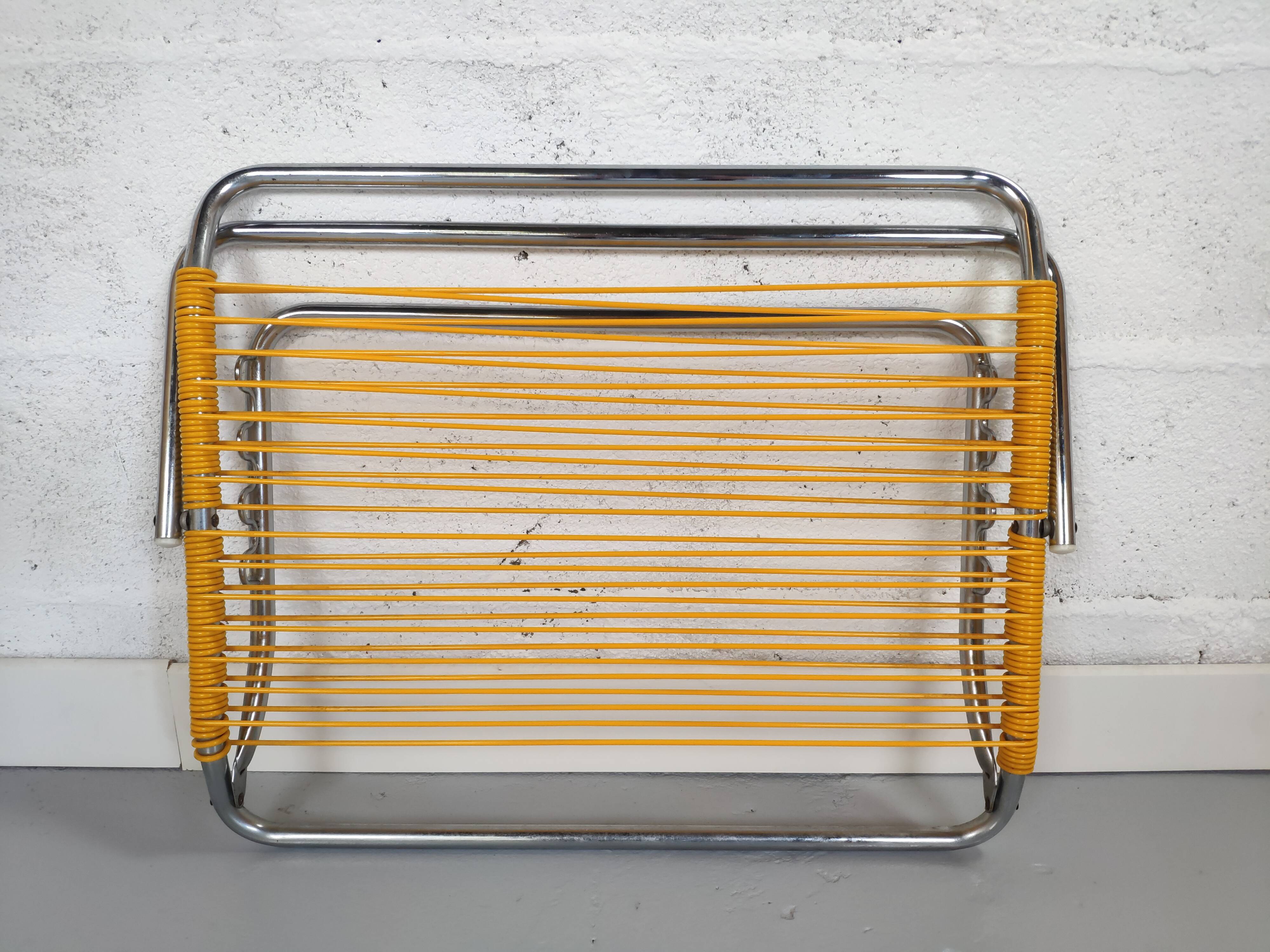 Yellow scoubidou head rest and vintage chrome metal