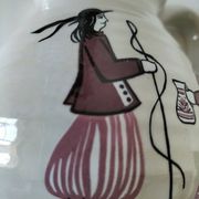 Ceramic pitcher from Quimper, created by Dominique Villard.