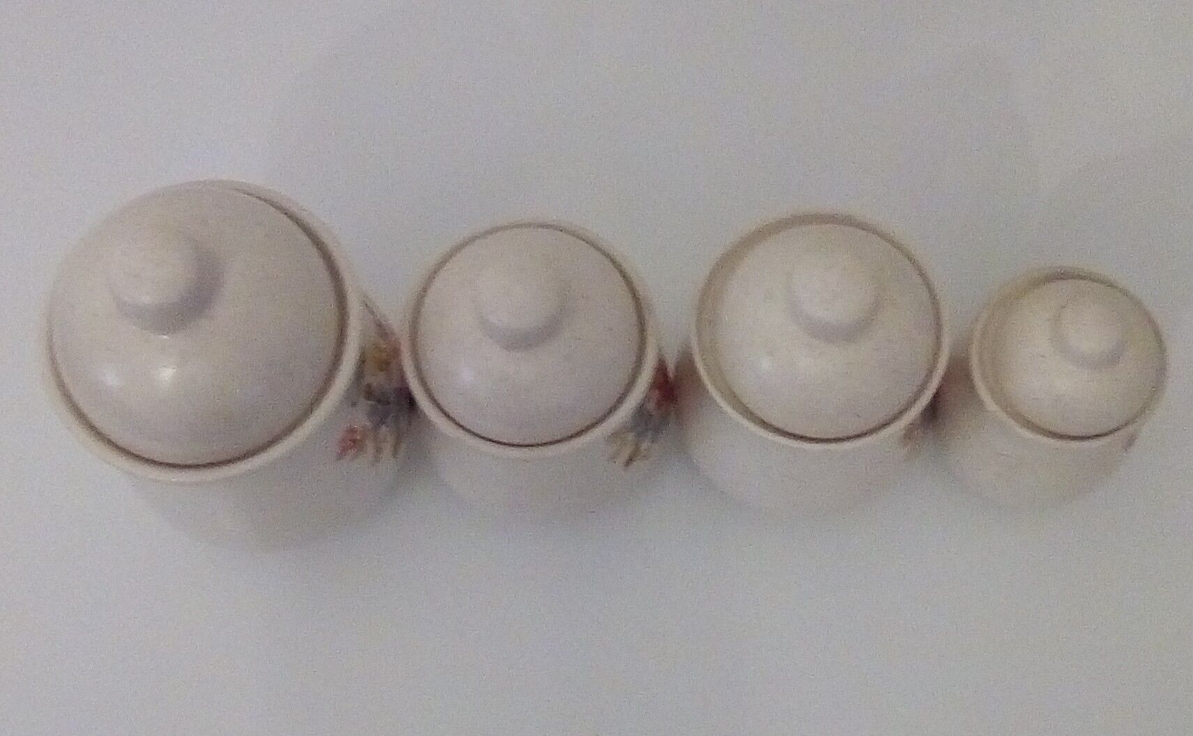 Series of 4 kitchen pots - floral motif