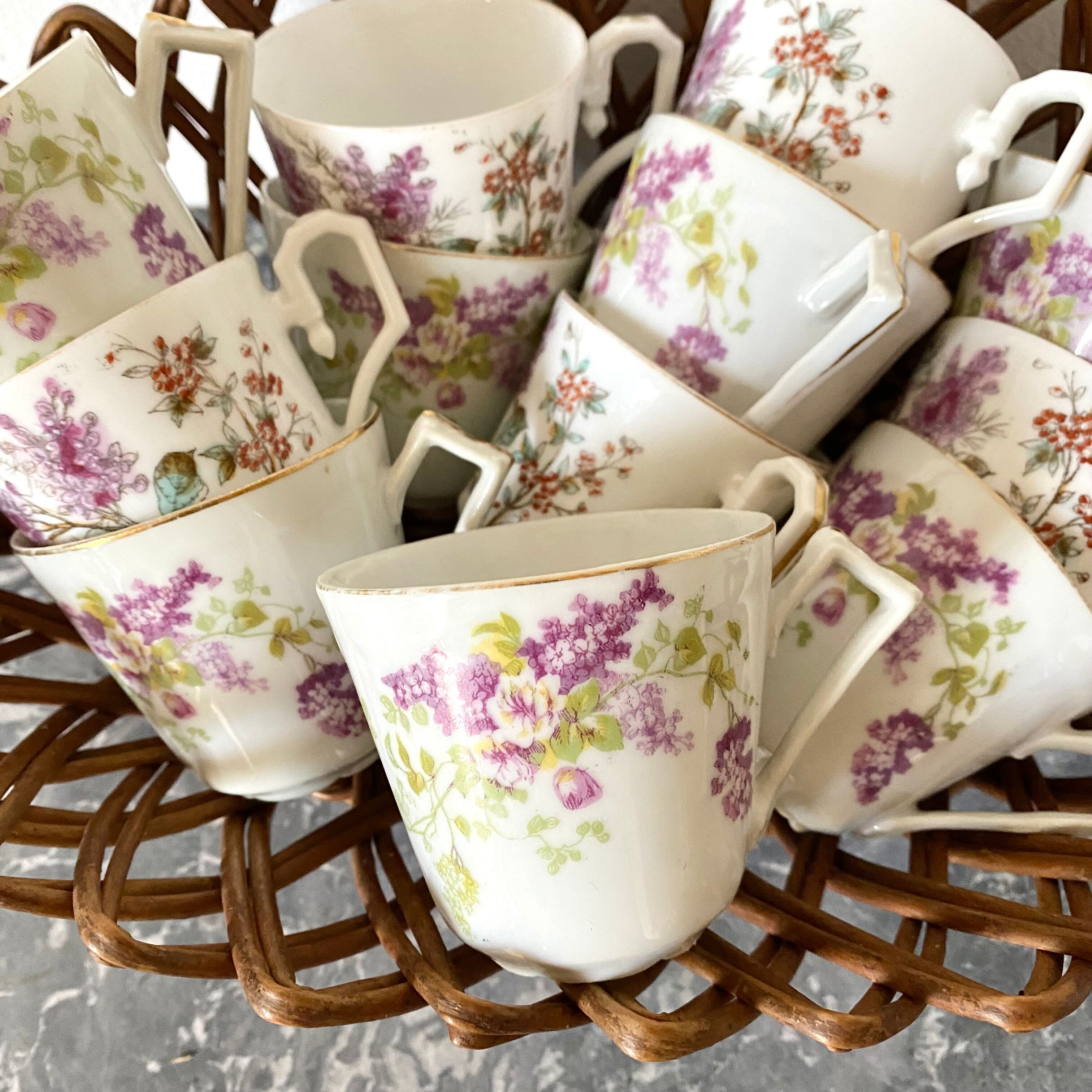 Antique flowered porcelain cups mismatched