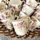 Antique flowered porcelain cups mismatched