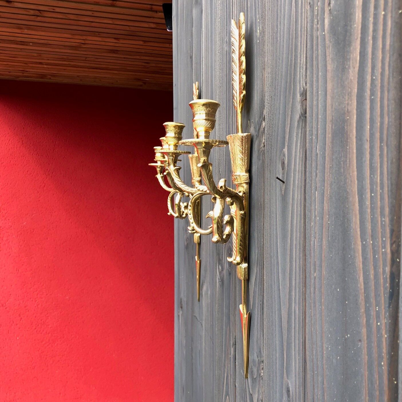 Pair of wall lamps decorated with bronze arrows "Cupid"