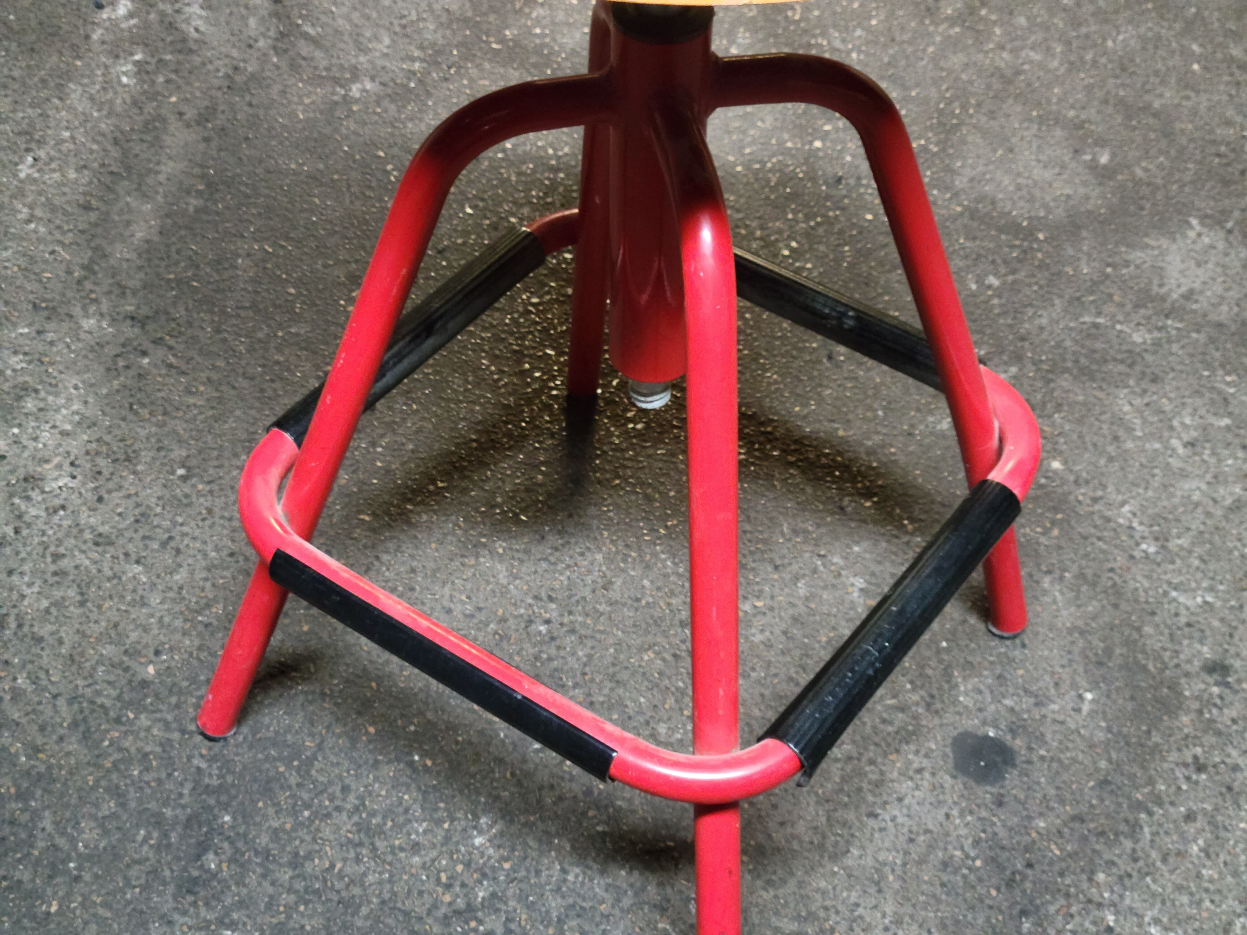 Red stool with industrial vintage screw 80s