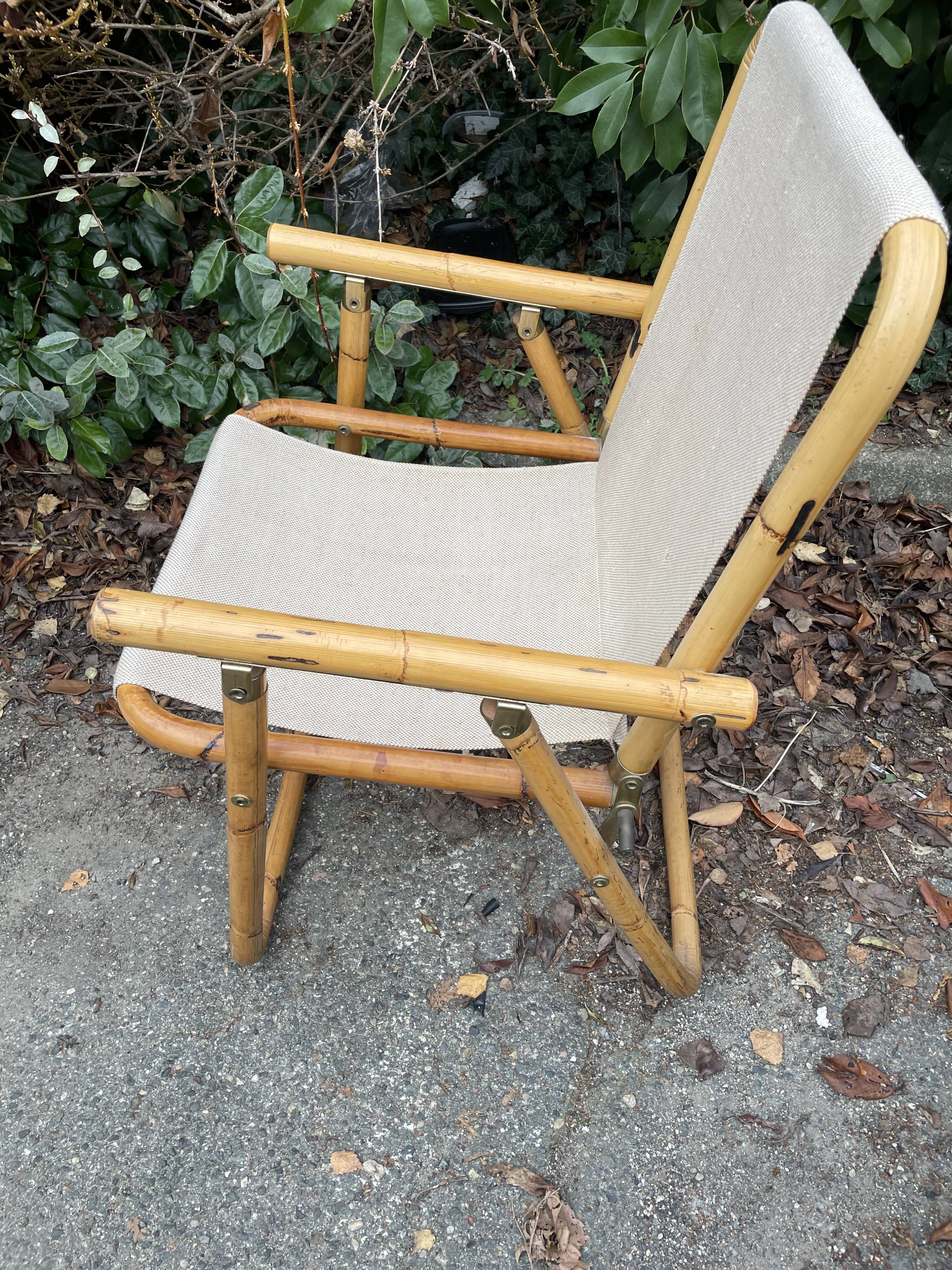 Rattan armchair and foldable canvas