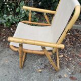 Rattan armchair and foldable canvas