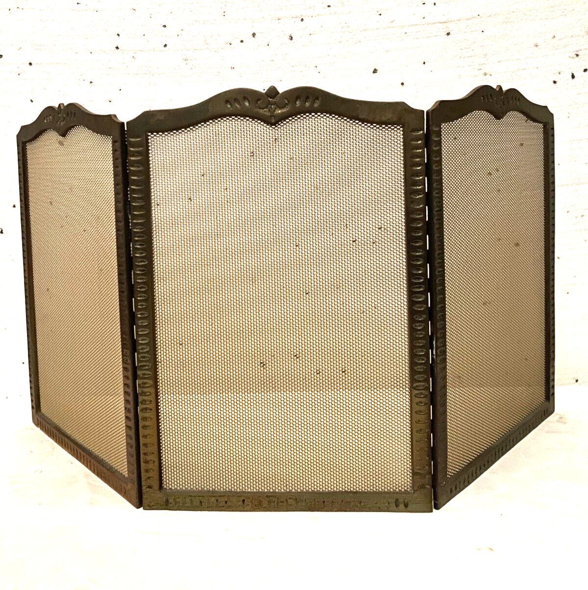 Bronze spark screen has three panels XX century