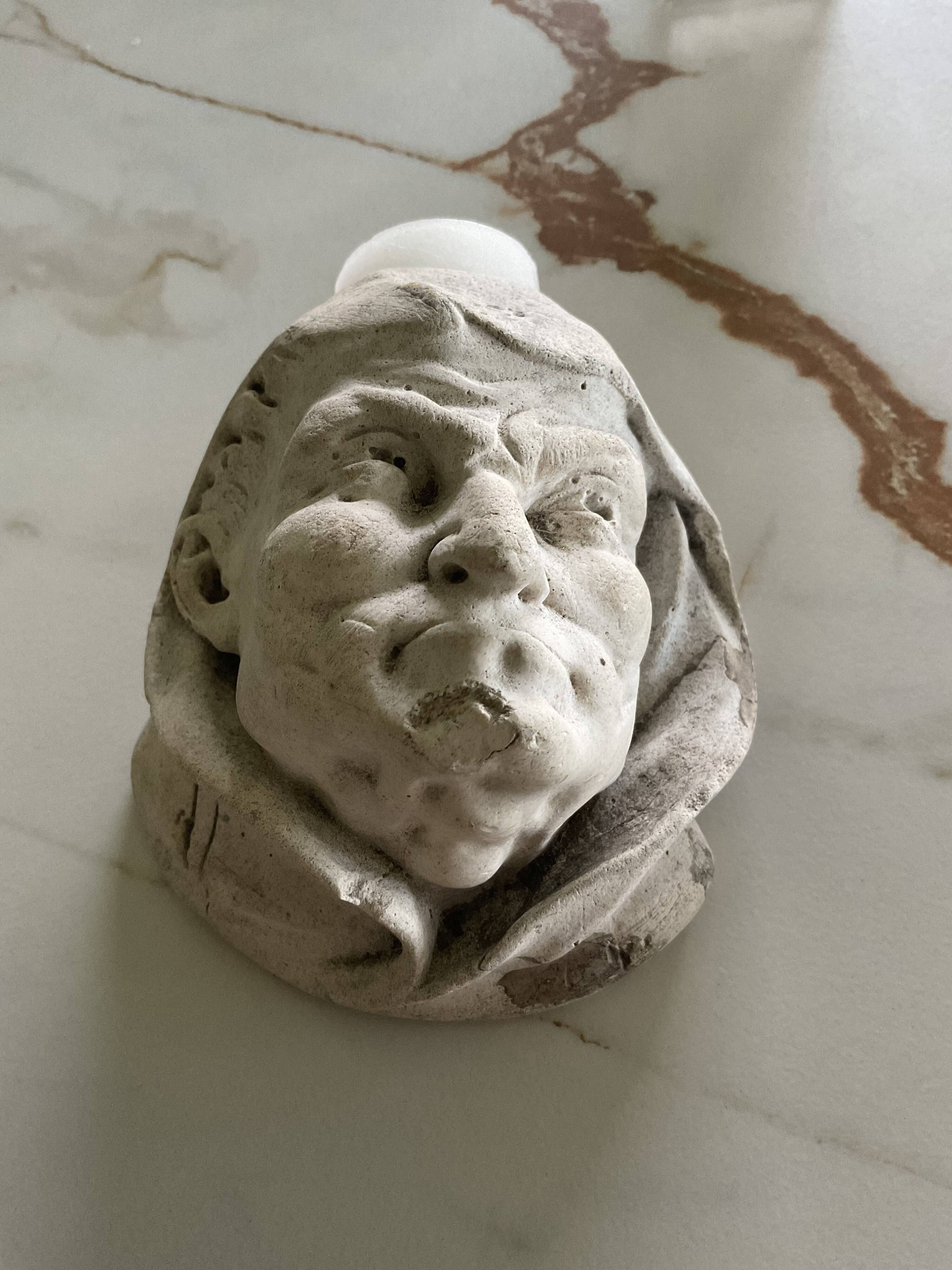 Monk's head candlestick. Antique.