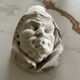 Monk's head candlestick. Antique.
