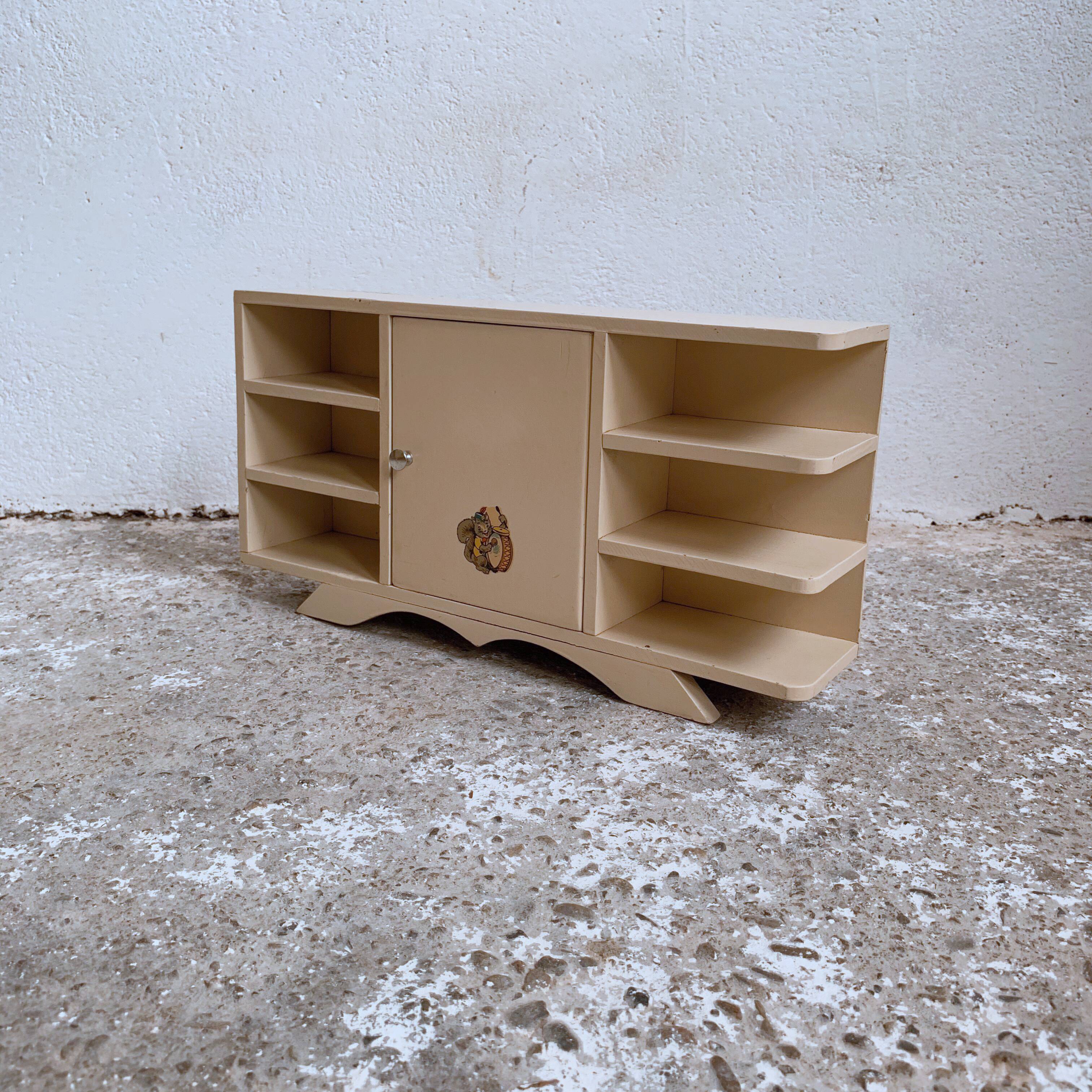 Old doll row wardrobe