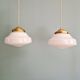 Pair of Art Deco pendant lights in white opaline.