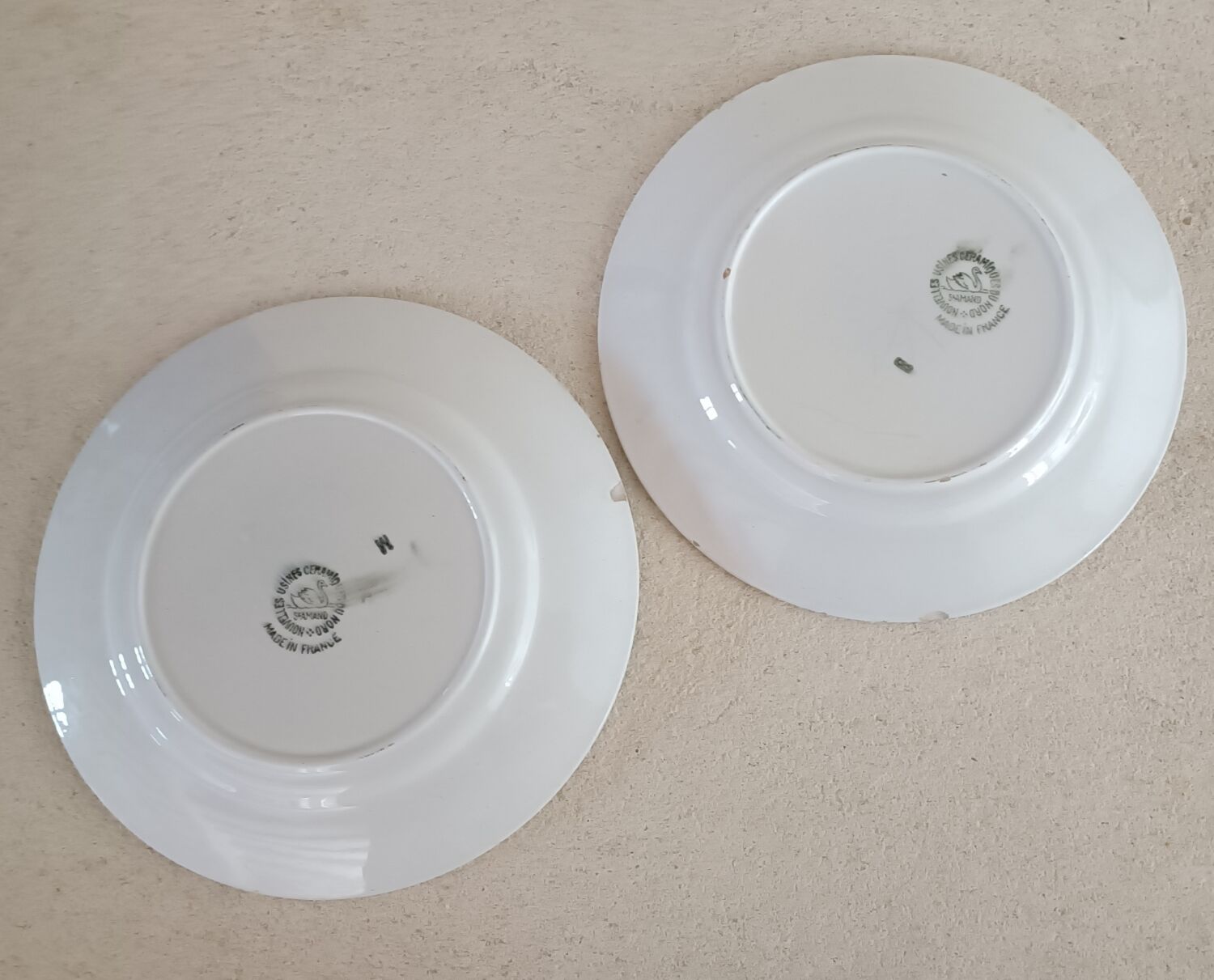 2 Saint Amand plates with castle decor