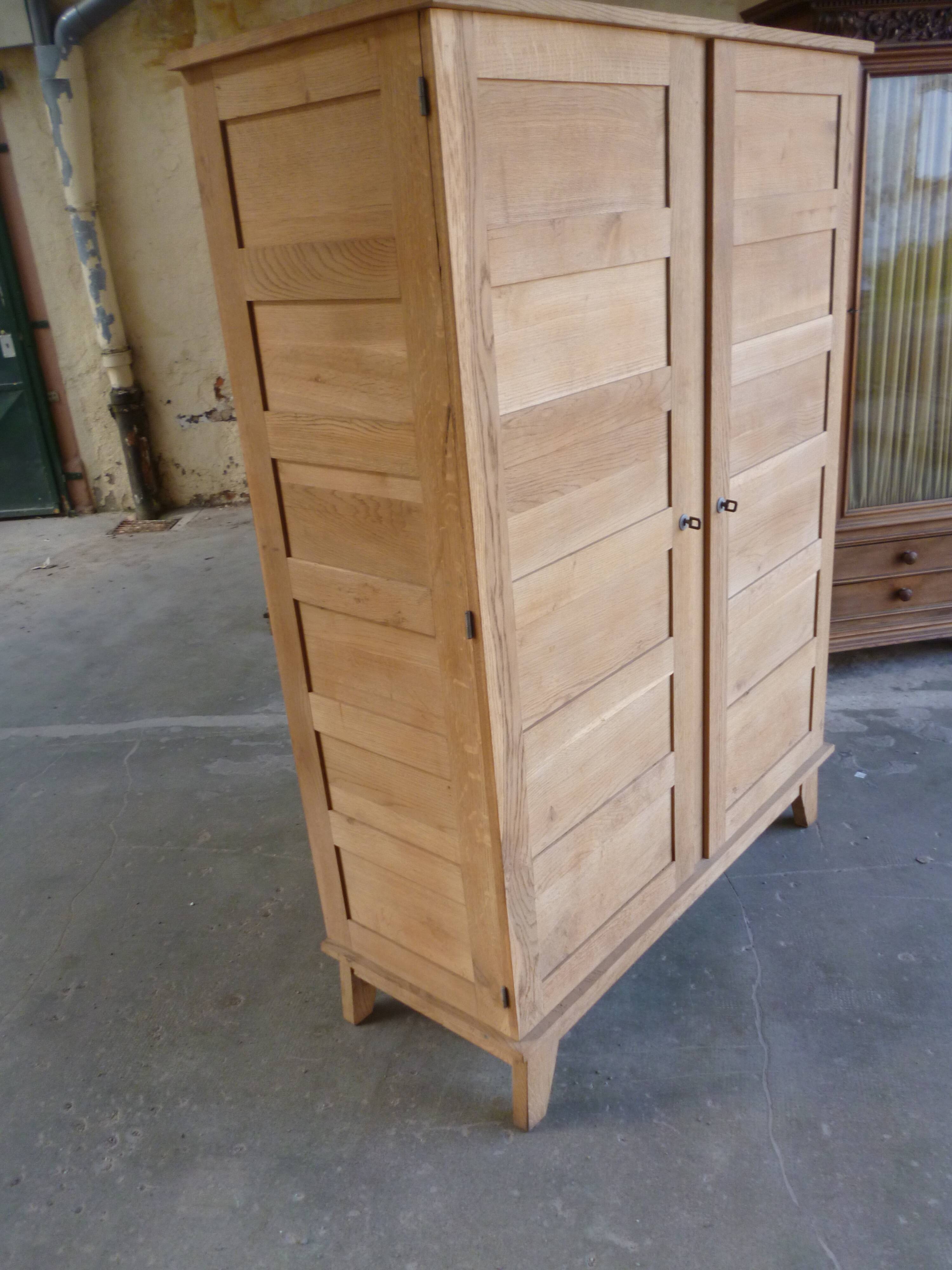 Oak cabinet by René Gabriel