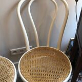 Couple of white bistro chairs