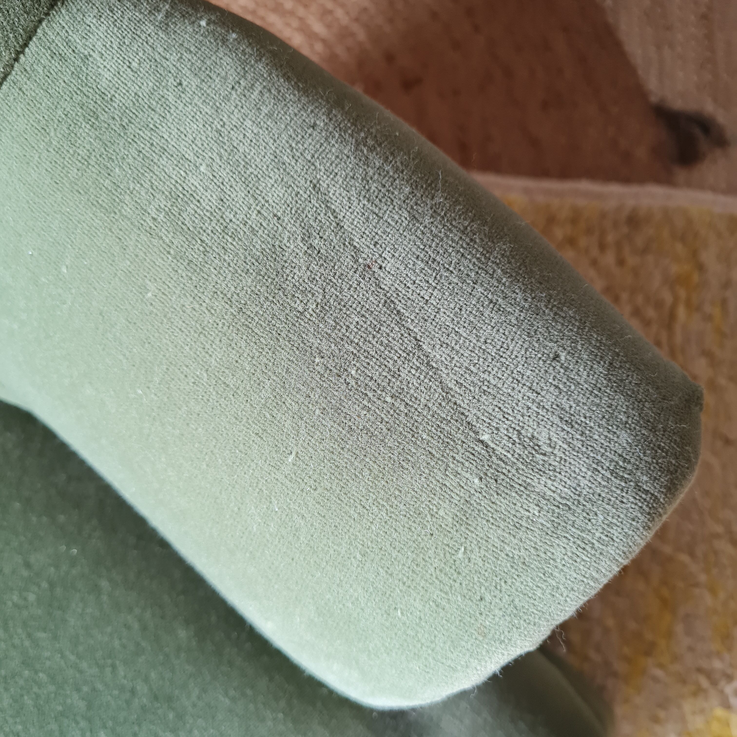 Green velvet armchair