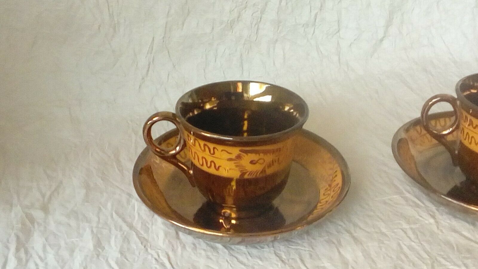 4 cups a cafe and under cups in faience of jersey