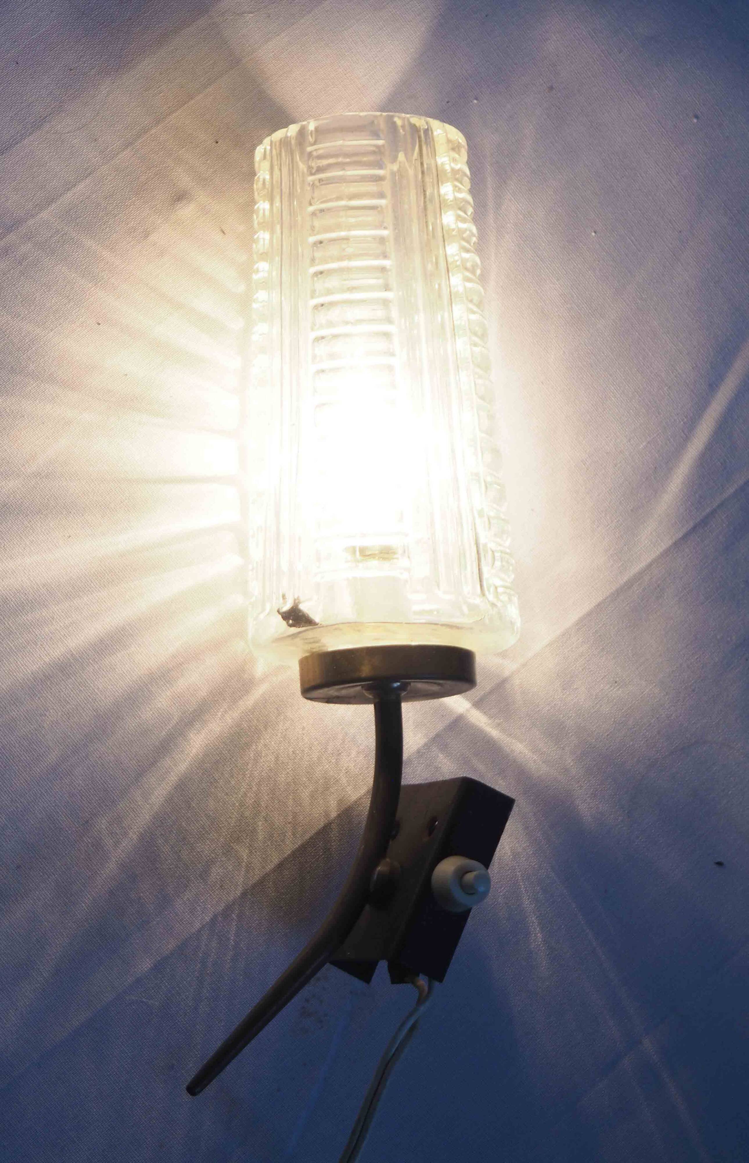 Glass and brass wall light