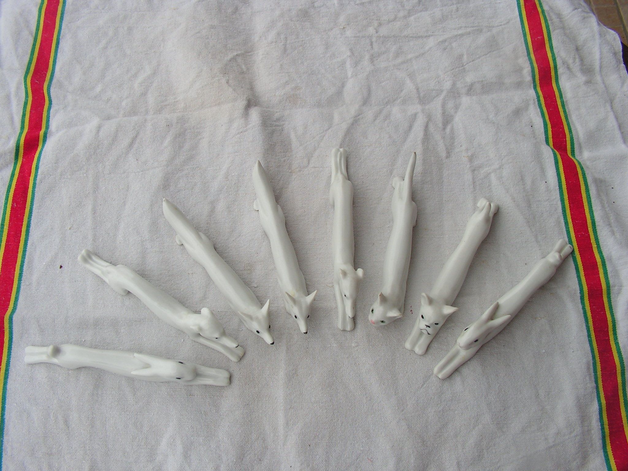Set of expensive rests in faience in the shape of animal dog rabbit cat fox