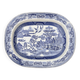 Large oval dish in blue and white English earthenware with Asian decoration, 19th century.