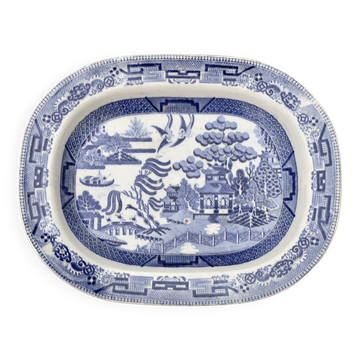 Large oval dish in blue and white English earthenware with Asian decoration, 19th century.