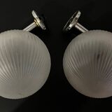 Pair of Inda metal and chiseled glass wall lights