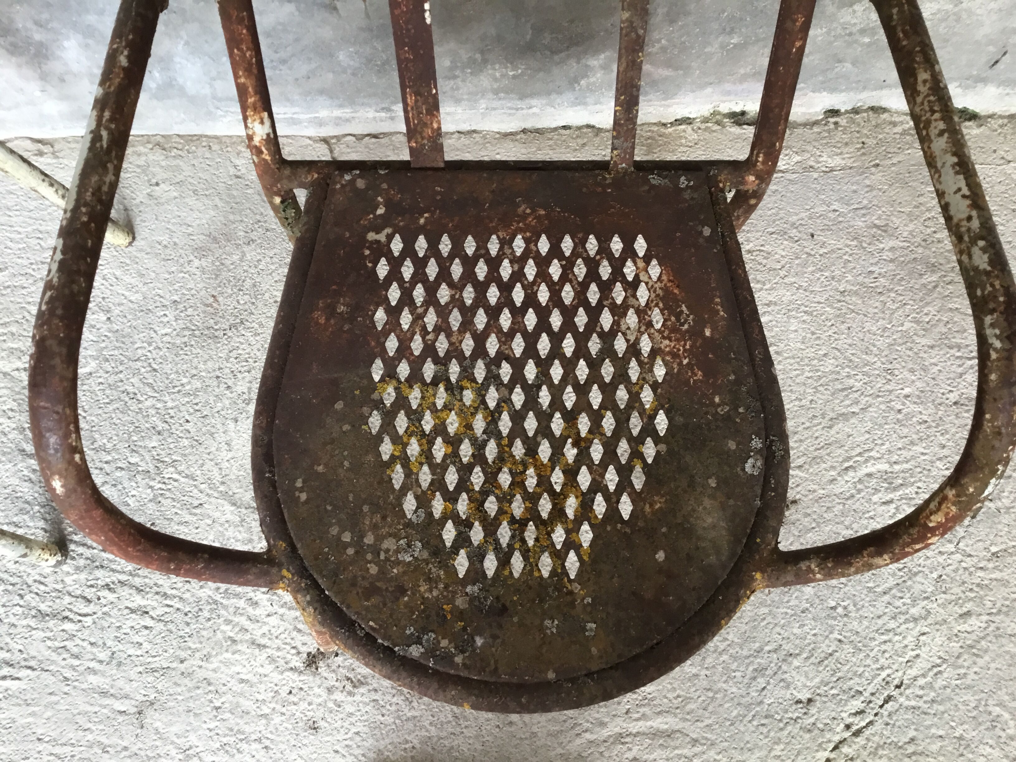 Pair of metal armchairs