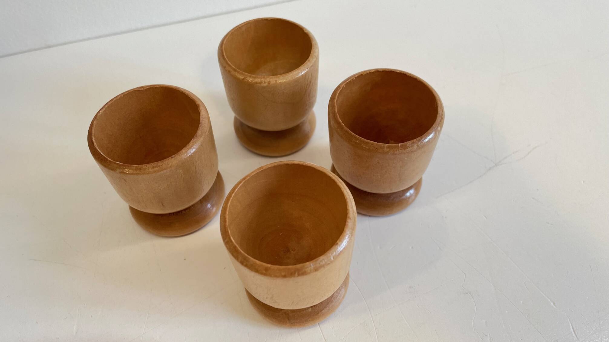 4 vintage turned wooden egg cups