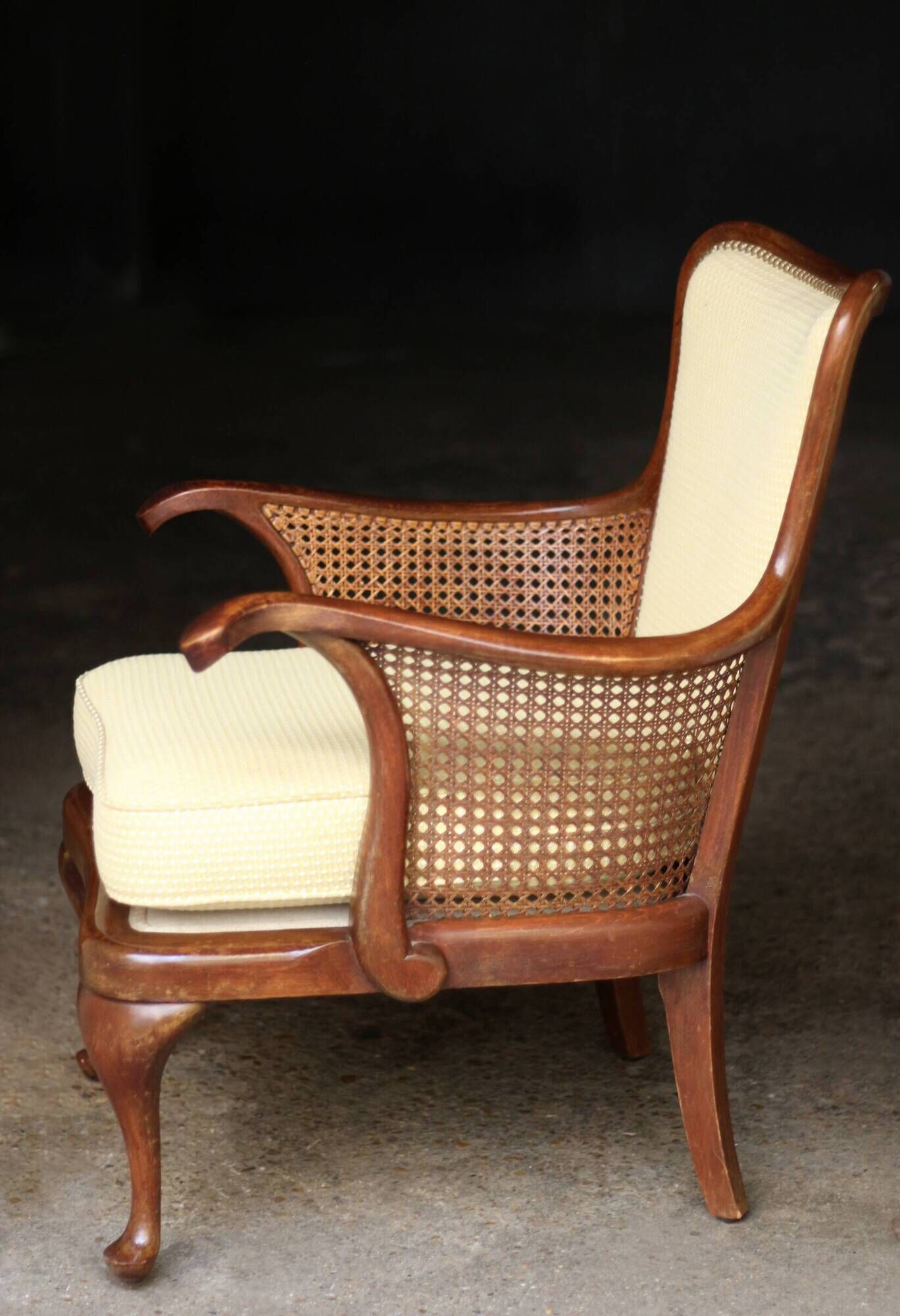 pair of mahogany and cane armchairs. English work (1960s).