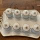 Porcelain tray and 8 matching cream pots. Antique