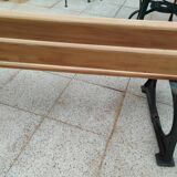 Garden bench with old cast iron legs